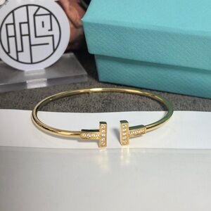 Tiffany & Co. Gold Bracelet with Diamond Accents